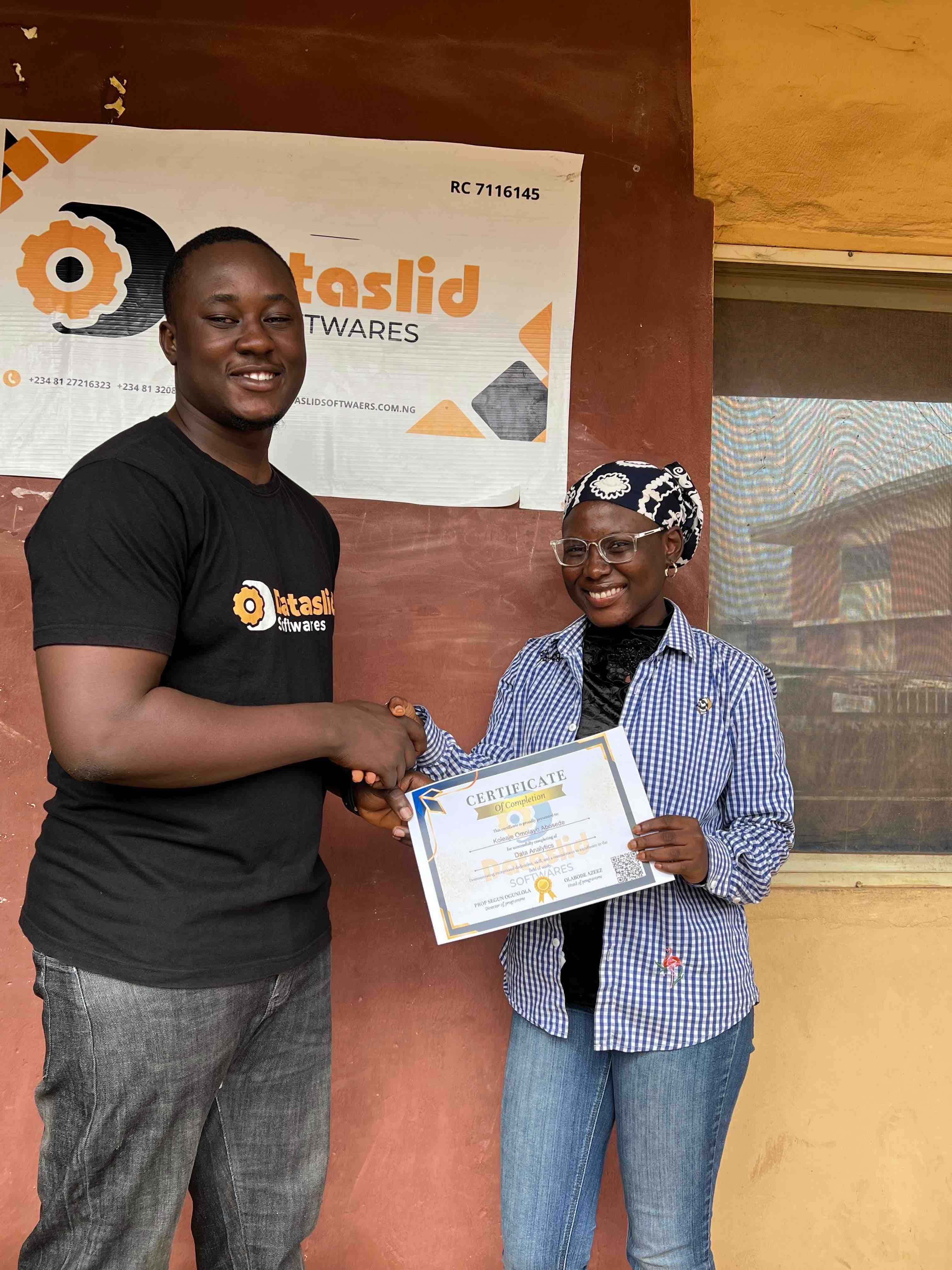 data analytics student receiving certificate